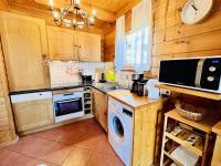 Kuchnia lub aneks kuchenny w obiekcie Chalet cosy au cœur du Dévoluy avec vue magnifique