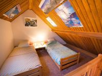 an overhead view of two beds in a room at Appartement Saint-Chaffrey , 3 pièces, 6 personnes - FR-1-330E-106 in Saint-Chaffrey