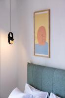 Postel nebo postele na pokoji v ubytování Aiora Suites