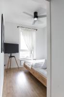 Posteľ alebo postele v izbe v ubytovaní Tuyo Apartments Lake park