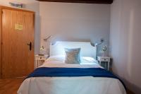 Posteľ alebo postele v izbe v ubytovaní Hotel Rural Princesa Kristina