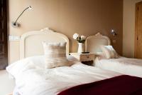 Posteľ alebo postele v izbe v ubytovaní Hotel Rural Princesa Kristina