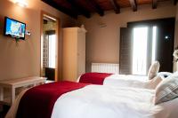 Posteľ alebo postele v izbe v ubytovaní Hotel Rural Princesa Kristina