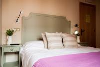 Posteľ alebo postele v izbe v ubytovaní Hotel Rural Princesa Kristina