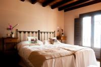 Posteľ alebo postele v izbe v ubytovaní Hotel Rural Princesa Kristina