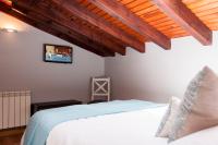 Posteľ alebo postele v izbe v ubytovaní Hotel Rural Princesa Kristina