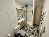 a bathroom with a toilet and a sink and a shower at Le cœur de Rive gauche - Superbe T3 - parking - 082 in Rouen