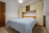 Posteľ alebo postele v izbe v ubytovaní Family friendly apartments with a swimming pool Verunic, Dugi otok - 14286