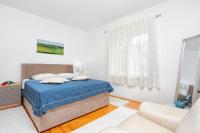 Posteľ alebo postele v izbe v ubytovaní Apartments with WiFi Split - 16420