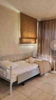 Posteľ alebo postele v izbe v ubytovaní Evita Maisonette, Elegant Beachfront apt, Polychrono