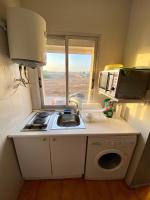 Kuchyň nebo kuchyňský kout v ubytování Apartamento cerca de la playa