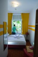 Posteľ alebo postele v izbe v ubytovaní Hotel City Residence