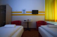 Posteľ alebo postele v izbe v ubytovaní Hotel City Residence