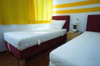 Posteľ alebo postele v izbe v ubytovaní Hotel City Residence