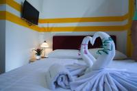 Posteľ alebo postele v izbe v ubytovaní Hotel City Residence