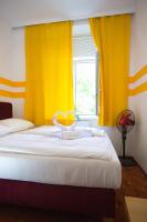 Posteľ alebo postele v izbe v ubytovaní Hotel City Residence