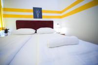 Posteľ alebo postele v izbe v ubytovaní Hotel City Residence