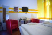 Posteľ alebo postele v izbe v ubytovaní Hotel City Residence