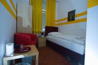 Posteľ alebo postele v izbe v ubytovaní Hotel City Residence