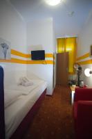 Televízia a/alebo spoločenská miestnosť v ubytovaní Hotel City Residence