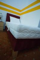 Posteľ alebo postele v izbe v ubytovaní Hotel City Residence