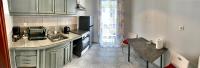 Kuchyň nebo kuchyňský kout v ubytování A&D City Apartment