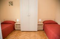 Postel nebo postele na pokoji v ubytování Family friendly seaside apartments Novalja, Pag - 16866