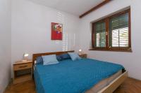 Posteľ alebo postele v izbe v ubytovaní Apartments by the sea Brela, Makarska - 16950