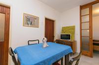 Televízia a/alebo spoločenská miestnosť v ubytovaní Apartments by the sea Brela, Makarska - 16950