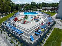 Bazén v ubytovaní Domki drewniane Zem-Tourist alebo v jeho blízkosti