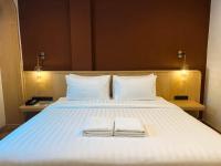 Postel nebo postele na pokoji v ubytování Sann Boutique Hotel