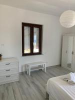 Posteľ alebo postele v izbe v ubytovaní KROTONIATI APARTMENT