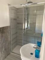 Kúpeľňa v ubytovaní KROTONIATI APARTMENT