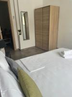 Posteľ alebo postele v izbe v ubytovaní Sofis House