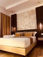 A bed or beds in a room at Suite SWEET DREAMS Dan champs