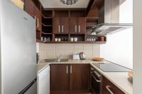 A kitchen or kitchenette at Budapest Holidays Apartments Family