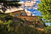 a house on top of a brick wall at Mazille Les Trois Monts in Mazille