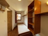 Łóżko lub łóżka w pokoju w obiekcie Appartement cosy avec piscine à 300m du lac de baignade, proche du village et des pistes - Praz-sur-Arly - FR-1-603-62