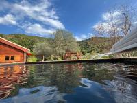 a swimming pool with a view of a house at U Mo Sognu in Murzo