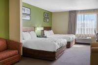 Ein Bett oder Betten in einem Zimmer der Unterkunft Sleep Inn &amp; Suites Bakersfield North