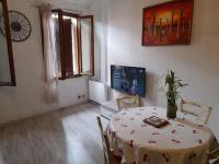 Telewizja i/lub zestaw kina domowego w obiekcie Madahouse