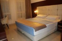 Golden Airport Hotelにあるベッド