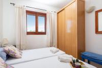 Postel nebo postele na pokoji v ubytování Villa Lucas