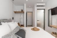 Posteľ alebo postele v izbe v ubytovaní Ammolofos Luxury Apartment & suites