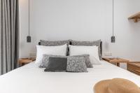 Posteľ alebo postele v izbe v ubytovaní Ammolofos Luxury Apartment & suites