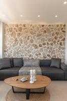 Posedenie v ubytovaní Ammolofos Luxury Apartment & suites