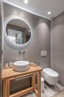 Kúpeľňa v ubytovaní Ammolofos Luxury Apartment & suites