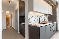 Kuchyňa alebo kuchynka v ubytovaní Ammolofos Luxury Apartment & suites