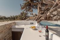Nápoje v ubytovaní Ammolofos Luxury Apartment & suites