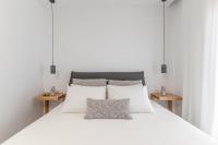 Posteľ alebo postele v izbe v ubytovaní Ammolofos Luxury Apartment & suites